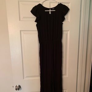 Black ruffle shoulder jumpsuit